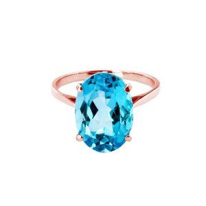 14K. SOLID GOLD RING WITH NATURAL OVAL BLUE TOPAZ